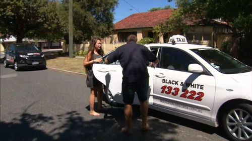 A woman is dropped off at the property today. (9NEWS)