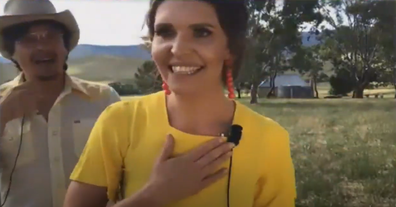 Fanny Lumsden accepts her award in a field