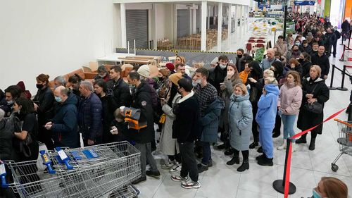 Massive queues outside an IKEA in Russia before it opens for the last time.