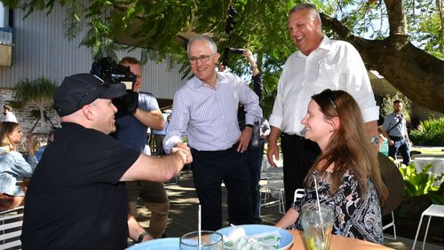 The prime minister and Longman LNP candidate Trevor Ruthenberg on the last full day of campaigning in Longman. Picture: AAP