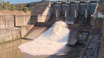 Wivenhoe Dam in Queensland begins releasing water.