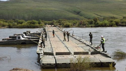 Russian combat engineers build a bridge in eastern Siberia.