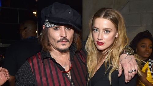 Johnny Depp and Amber Heard attend the 58th Annual Grammy Awards at the Staples Center on February 15, 2016 in Los Angeles, California.