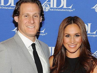 Trevor Engelson and Meghan Markle