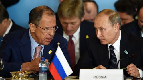 Russian Foreign Minister Sergei Lavrov (left) and President Vladimir Putin. (Getty)