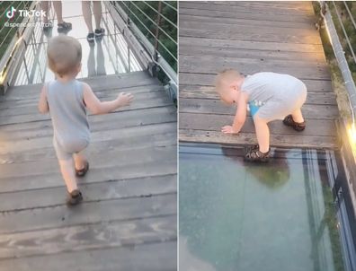 Toddler trying to walk over a glass bridge. 