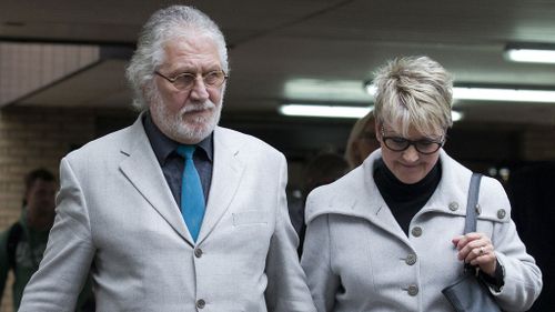 The ex-Top Of The Pops presenter was found guilty of the indecent assault of a female researcher who was working on the Mrs Merton Show in January 1995. He is pictured leaving court with his wife. (AAP)