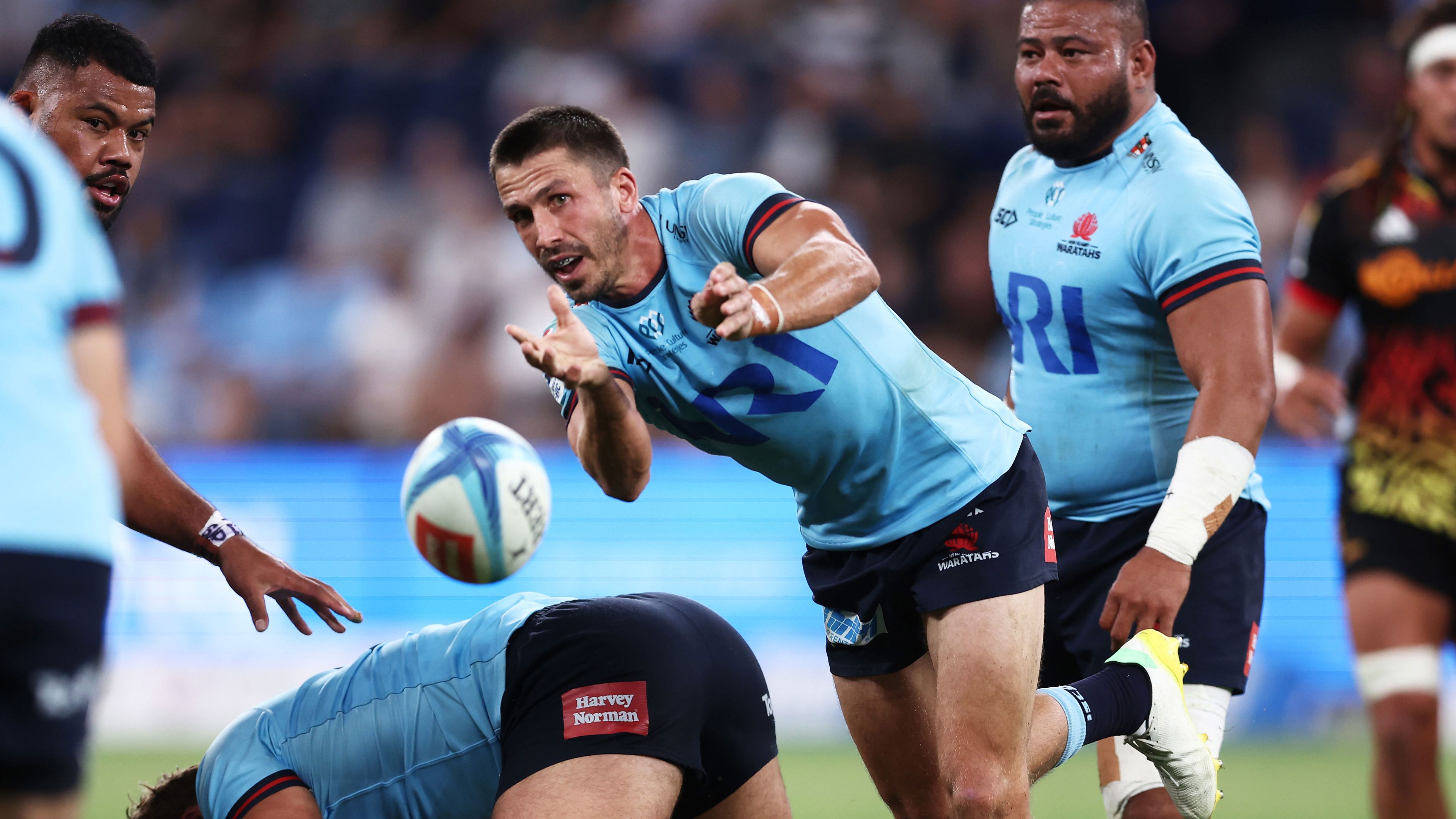 Jake Gordon of the Waratahs passes during the round five Super Rugby Pacific match between NSW Waratahs and Chiefs at Allianz Stadium, on March 24, 2023.