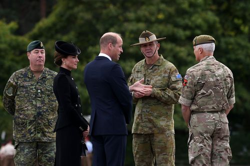 Prince William, Prince of Wales and Catherine, Princess of Wales meet with military personnel during a visit to Army Training Centre Pirbright.