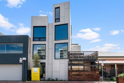 Eight shipping containers rise and surprise on Adelaide's smallest block