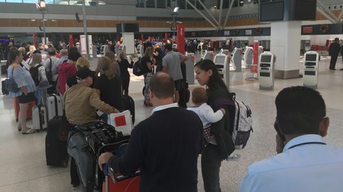 Travellers are facing queues of up to 200 metres long. (Image: Max Roberts)