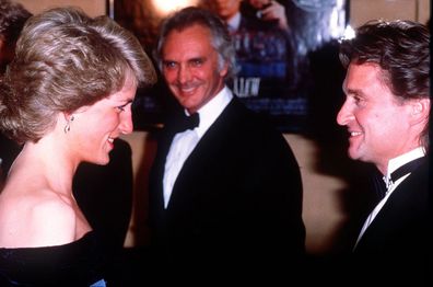 Princess Diana attends the premiere of the film Wall Street. Pictured here meeting American actor Michael Douglas, 27th April 1988