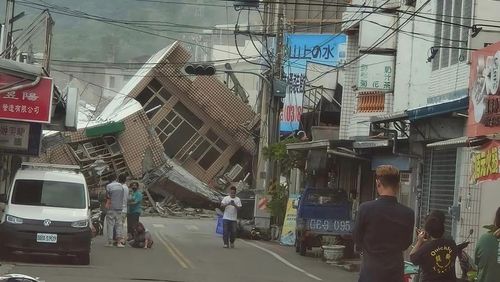 This image shows a collapsed building in southern Taiwan following a powerful earthquake on Sunday.