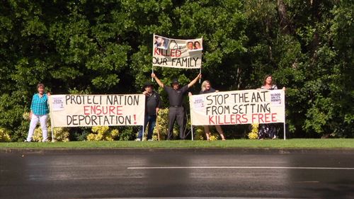 The group chanted "Stop the AAT from setting killers free".