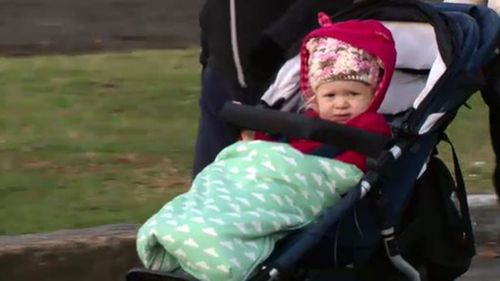 Early risers rugged up across the city. (9NEWS)