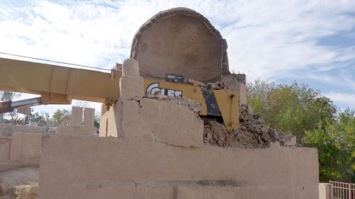 The crane smashed into the centuries-old tomb when it was lifting blocks of sculpted masonry. (AFP)