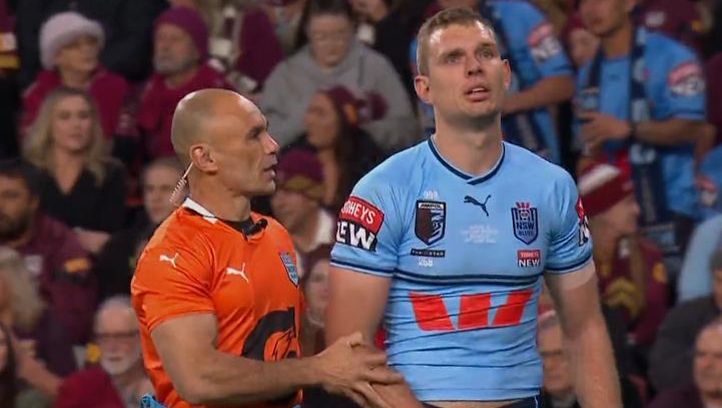 Tom Trbojevic looks dejected as he is helped from the field in the opening minutes of Origin II.