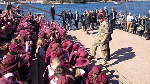 Prince Harry greets schoolchildren at the Opera House. (Kensington Palace)