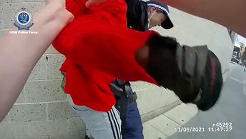 NSW Police has released bodycam footage of a man allegedly assaulting two female officers in Bankstown yesterday.
