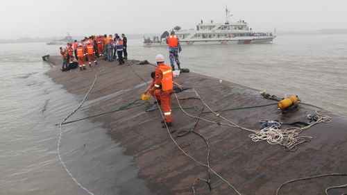 Rescuers race against clock to find survivors of Chinese ship