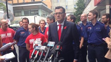 Premier-elect Daniel Andrews announces an end to the pay dispute and calls for the board of Ambulance Victoria to resign. (Andrew Lund, 9NEWS)