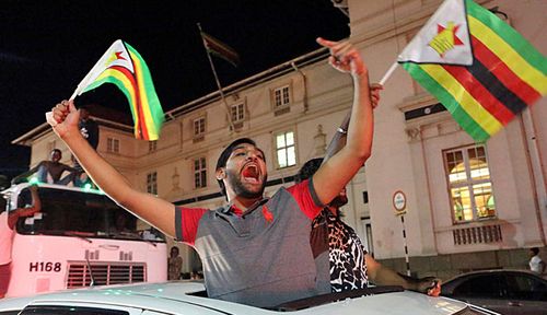 Zimbabwe's public celebrated the end of Robert Mugabe's grip on power. (Photo: AP).