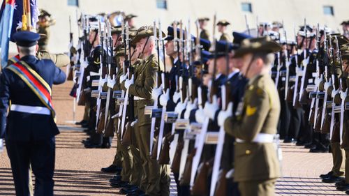 The Australian Federation Guard outside Parliament House for Mr Hurley's swearing-in ceremony.