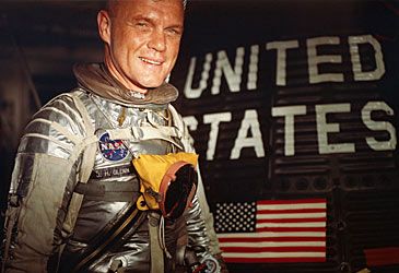 Which NASA program was John Glenn first recruited for?
