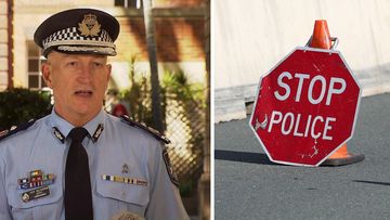 Queensland Police have revealed an incoming truck driver attempted to drive at border officers after an altercation at the NSW border.