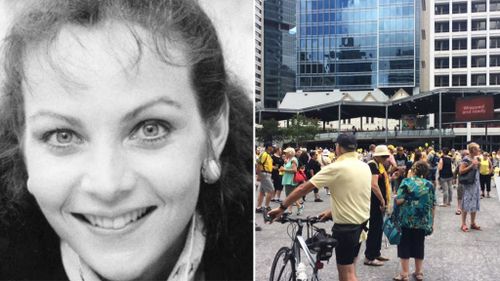 Queenslanders dressed in yellow to attend the rally in King George Square. (9NEWS)