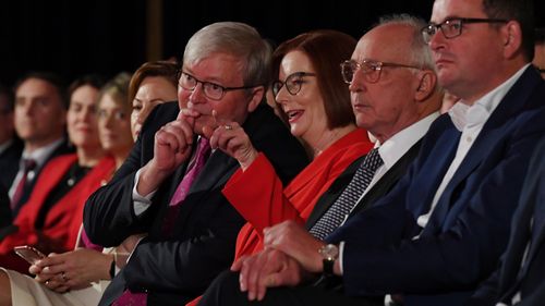 Former foes Rudd and Gillard share a moment.