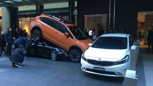 Oops! A valet parker in Sydney has a disaster outside the Hyatt Regency.