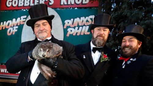 Phil's handlers said the furry rodent has called for six more weeks of winter. (AP/AAP)