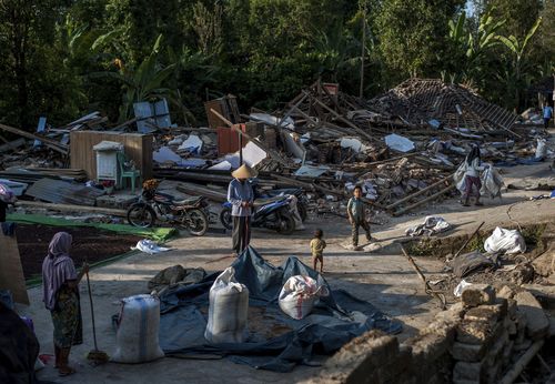 Nearly 1500 people have also been hospitalised with serious injuries from the quake, while more than 156,000 people have been displaced from their homes. Picture: AAP.