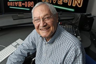 FILE - Producer Roger Corman poses in his Los Angeles office, May 8, 2013. Corman, the Oscar-winning King of the Bs who helped turn out such low-budget classics as Little Shop of Horrors and Attack of the Crab Monsters and gave many of Hollywood&#x27;s most famous actors and directors an early break, died Thursday, May 9, 2024. He was 98. (AP Photo/Reed Saxon, File)