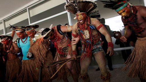 Tribal protesters with arrows try to enter Brazil's Congress