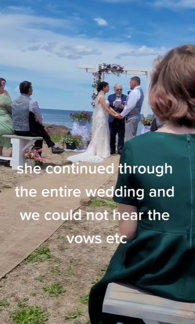 Neighbour mows lawn during wedding video