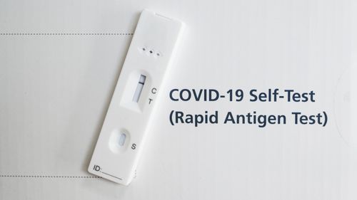 A rapid antigen test or lateral flow home testing kit.