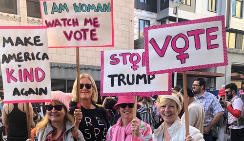 Pink banners with a strong message.