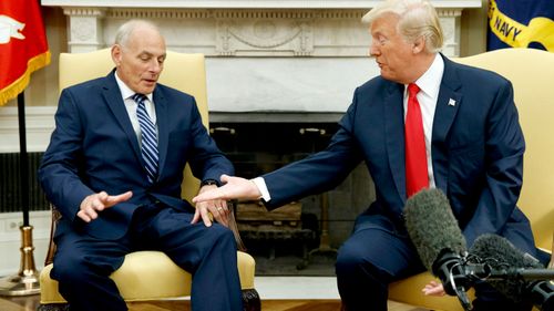 President Donald Trump meets with new White House Chief of Staff John Kelly after he was privately sworn in during a ceremony in the Oval Office. (AAP)