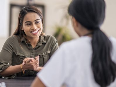 Woman talking to her doctor