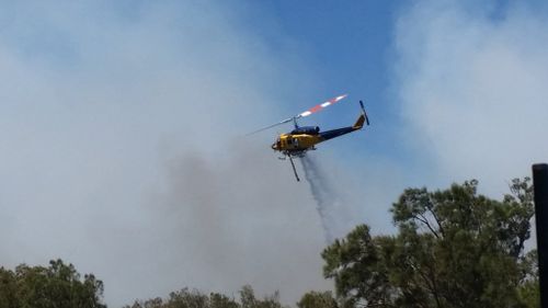 Bushfire emergency warning issued for Forrest Highway and surrounds at Waroona, south of Perth