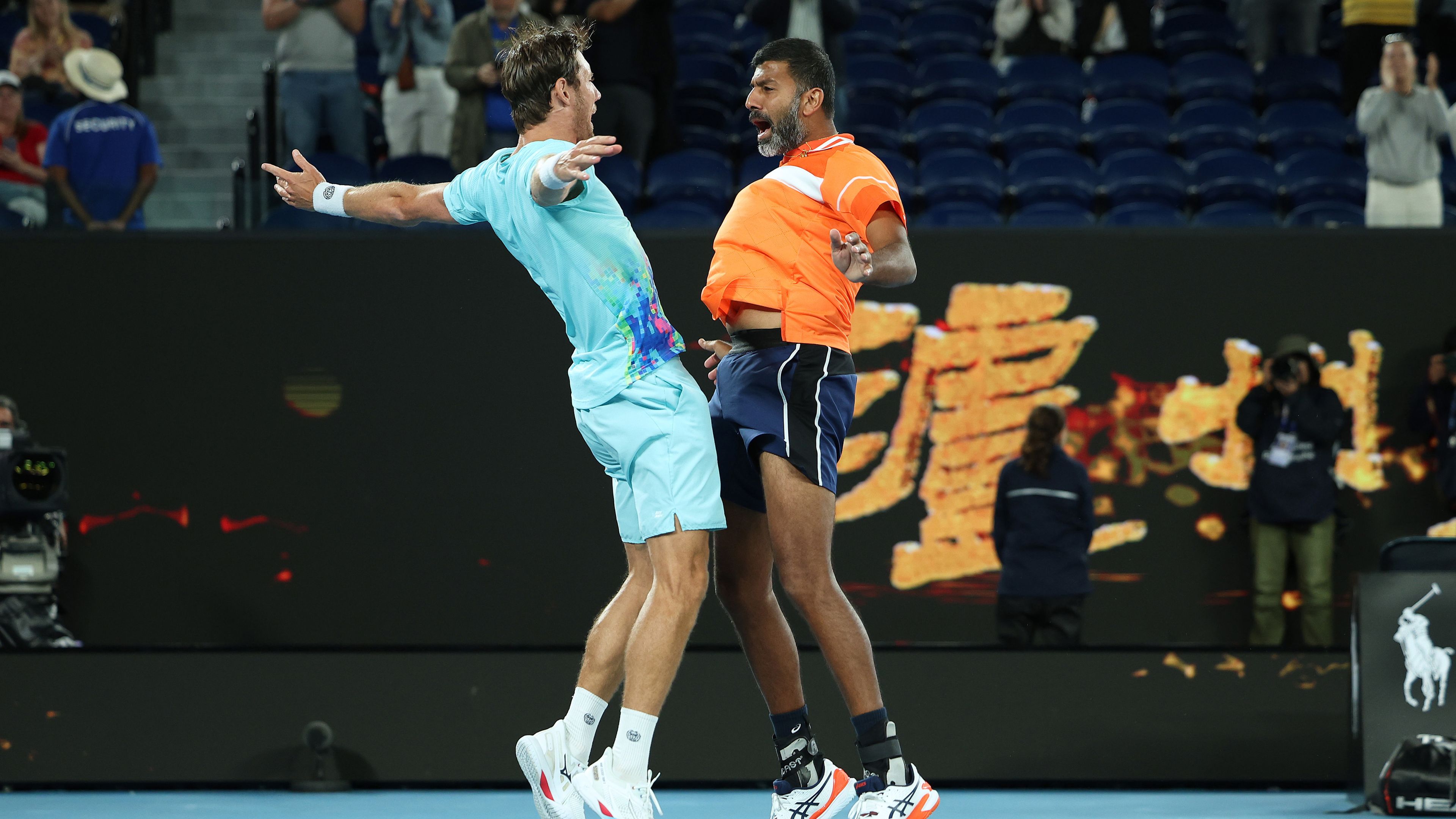 Matthew Ebden of Australia and Rohan Bopanna of India celebrate winning championship point in their Mens Doubles Final match against Simone Bolelli and Andrea Vavassori of Italy during the 2024 Australian Open at Melbourne Park on January 27, 2024 in Melbourne 