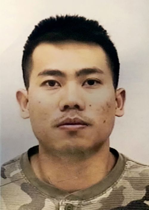Peter Van Bawi Lian is accused of killing his wife before flying to Thailand from the US.