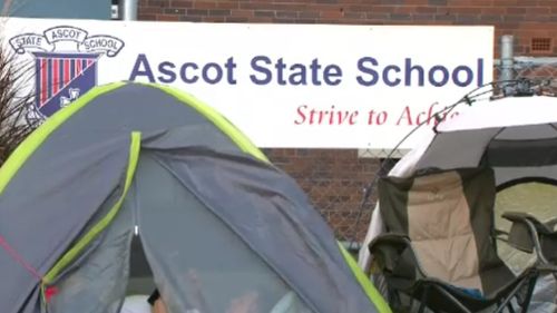 A line of tents outside Ascot State School this morning. (9NEWS)