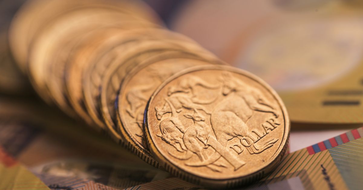 Australian dollar cracks 70 US cents on climb to three-year high