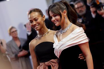 Zoe Saldana,left, and Selena Gomez pose for photographers upon departure from the premiere of the film &#x27;Rumours&#x27; at the 77th international film festival, Cannes, southern France, Saturday, May 18, 2024. (Photo by Millie Turner/Invision/AP)
