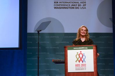 Sharon Stone speaks as she presents the inaugural Elizabeth Taylor Award to brothers Dr. Kamiar Alaei and Dr. Arash Alaei,at  the opening day of the AIDS 2012 - XIX International AIDS Conference at the Walter E. Washington Convention Center on July 22, 2012 in Washington, DC. 