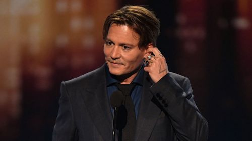 Johnny Depp paid someone to ‘feed him lines’ through an earpiece