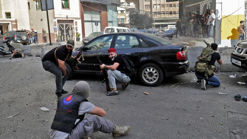 Fighters from the Hezbollah and Amal movements are seen during the clashes in Beirut.